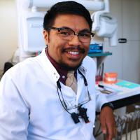 Dentist in dental office