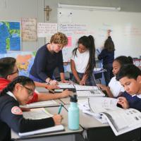 St. Paul School photo of teacher with children